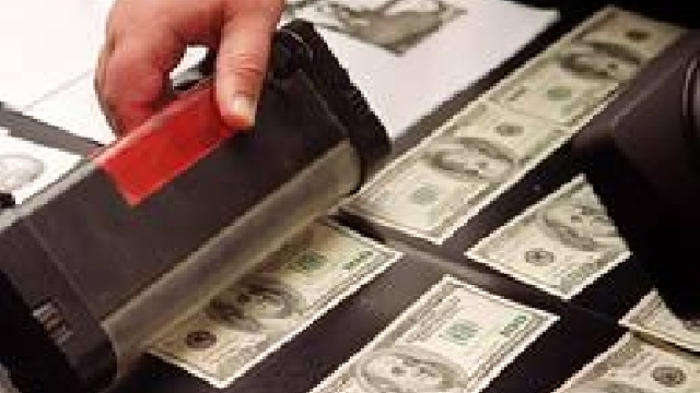 13 persoane condamnate pentru fabricarea banilor falși