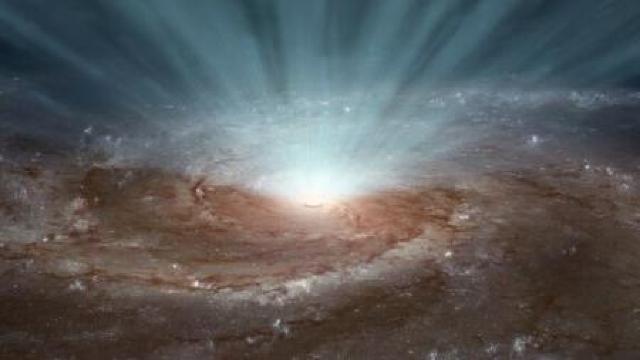 Vânt cosmic generat de o gaură neagră uriașă care poate modifica destinul unei galaxii