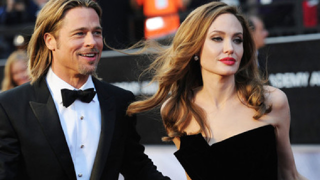 Brad Pitt și Angelina Jolie vor să adopte un copil sirian