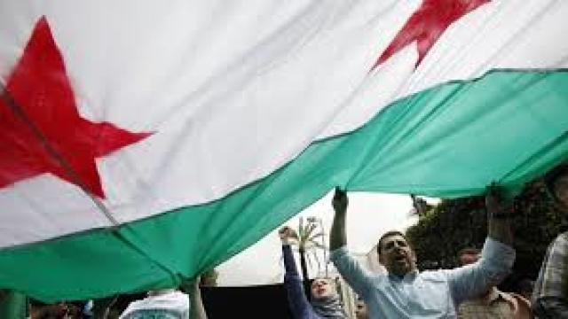 BBC: Steagul sirian a fost înălțat în orașul Douma, ultimul bastion rebel 
