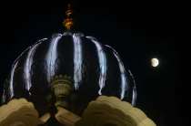 The not so red moon beside the Golden temple in Amritsar. Photograph: Narinder Nanu/AFP/Getty Images