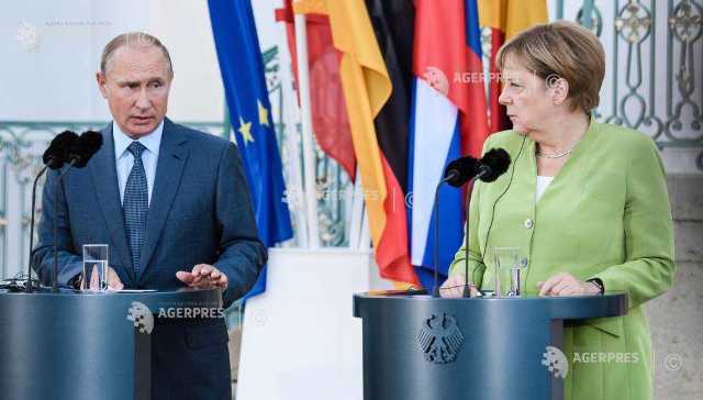 Prima întâlnire bilaterală dintre Merkel și Putin după anexarea Crimeei a rămas fără niciun acord (FOTO)