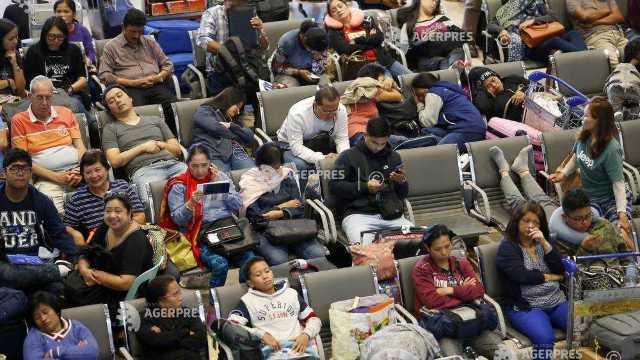 Aproximativ 9.000 de pasageri, blocați pe un aeroport din vestul Chinei din cauza ploilor torențiale