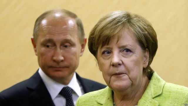 Merkel a vorbit cu Putin la telefon despre războiul din Siria și cel din Ucraina
