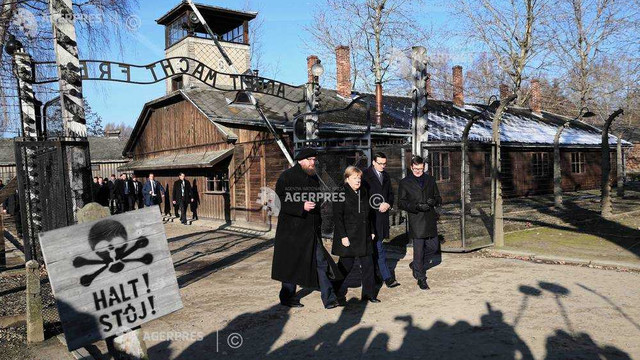 În vizită la Auschwitz, Angela Merkel își exprimă „rușinea profundă”