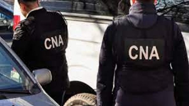 CNA efectuează percheziții la câteva companii în dosarele pornite pentru obținerea frauduloasă a cetățeniei române