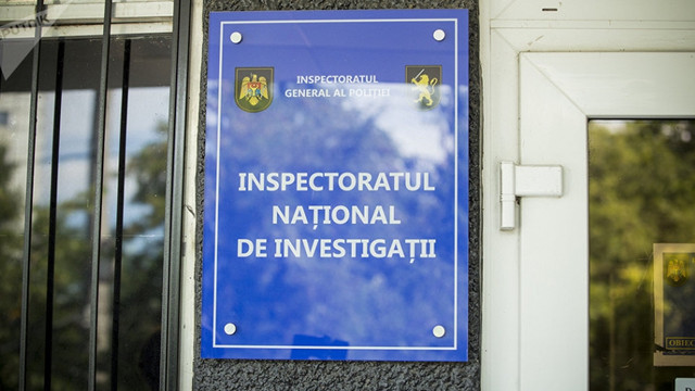 Doi ofițeri ai Inspectoratului Național de Investigații, reținuți în urma unui denunț la linia națională anticorupție