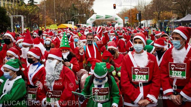 Madrid | Mii de Moș Crăciuni au alergat într-o cursă caritabilă în beneficiul victimele erupției din La Palma