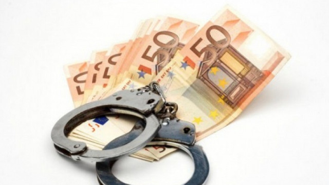 Un ofițer al sectorului de Poliție Botanica, reținut de CNA pentru o mită de 2500 de euro