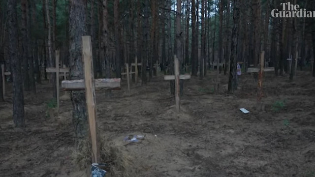 VIDEO | Imaginea atrocităților comise de ruși la Izium: sute de morminte și o groapă comună descoperite într-o pădure după retragerea rușilor