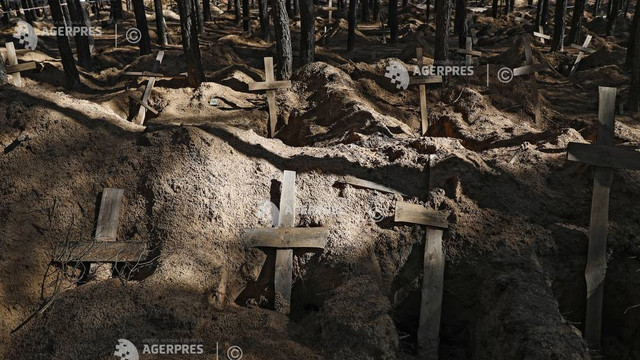 Circa 1.000 de cadavre au fost exhumate până acum în teritoriile recent eliberate din Ucraina