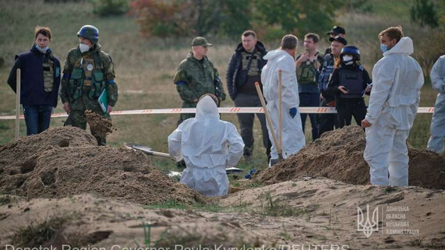 Ucraina: O groapă comună și alte aproximativ 200 de morminte, descoperite în orașul Liman 