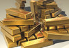 Prețul aurului a atins un maxim istoric de 2.135 dolari pe uncie