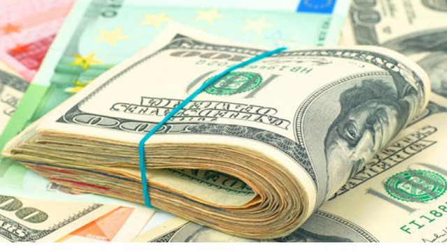 Leul moldovenesc se apreciază față de dolar