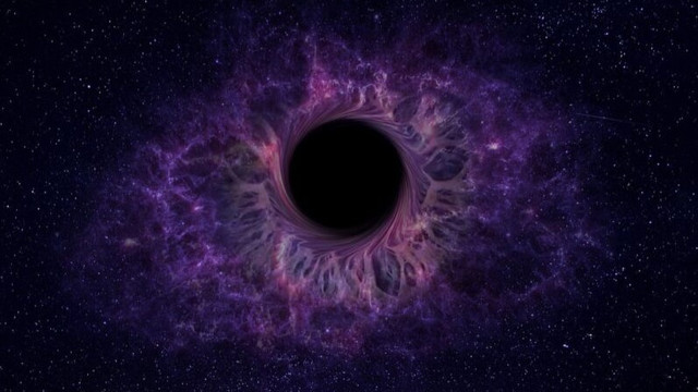 Astronomii au descoperit o gaură neagră care își consumă propria istorie