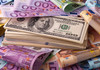 Leul se apreciază față de euro și dolar