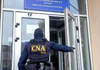 CNA efectuează percheziții într-un dosar de corupție în cadrul Serviciului Fiscal de Stat. Un funcționar a fost reținut