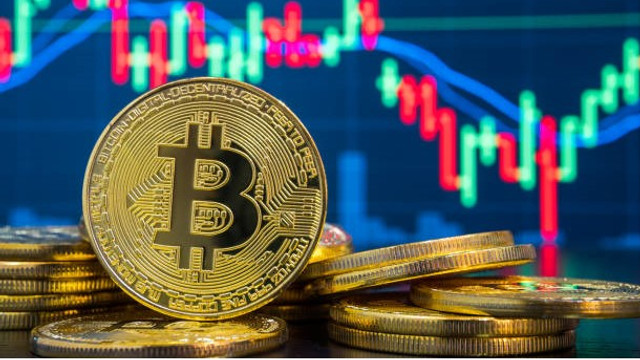 Nou record pentru bitcoin, care a depășit pragul de 125.000 de dolari