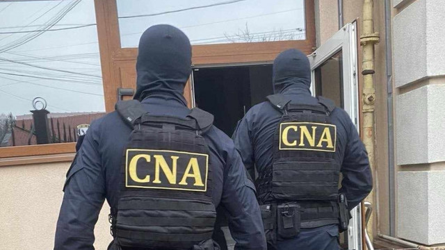 CNA desfășoară percheziții într-un dosar de corupție ce vizează funcționari

