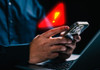 Două persoane, reținute pentru implicare într-o schemă de escrocherie cu investiții online