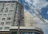 FOTO | Incendiu la mansarda unui bloc din Chișinău. Două persoane au avut nevoie de îngrijiri medicale